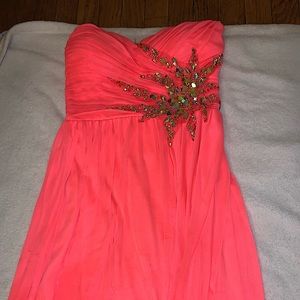 Pink formal dress, size 3, the brand it came from is Deb.